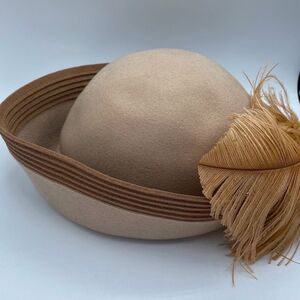 Vintage Mr. John Classic 100% wool hat with feather plume.